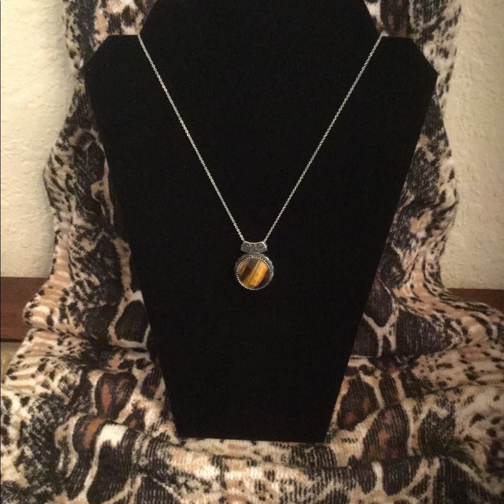 Genuine Tigers Eye gem pendant.